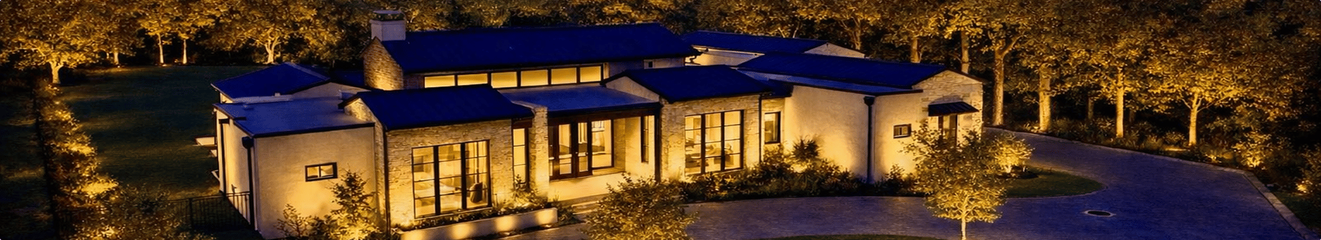 Modern home with a covered patio and outdoor living area beside a backyard pool